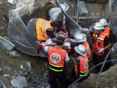 Rescue work after Israeli missiles hit targets in Gaza. AFP 