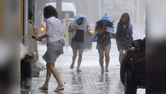Typhoon Neoguri hits Japan's mainland, to reach Fukushima nuke plant soon
