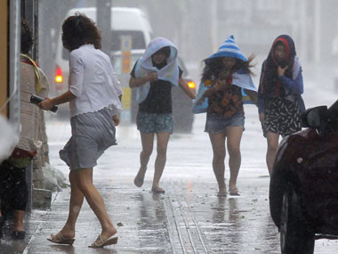 Typhoon Neoguri hits Japan as residents stay out of harms way Typhoon Neoguri hits Japan as residents stay out of harms way