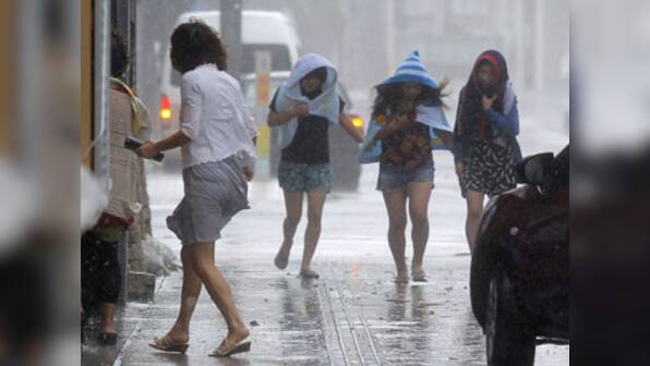 Typhoon Neoguri hits Japan's mainland, to reach Fukushima nuke plant soon