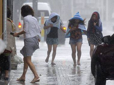 Typhoon Neoguri hits Japan's mainland, to reach Fukushima nuke plant soon