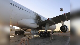 More foreigners exit Libya as Tripoli clashes kill 22