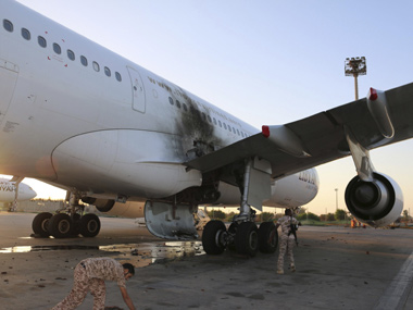 Libya: Three dead as rival militias battle for Tripoli airport Libya: Three dead as rival militias battle for Tripoli airport