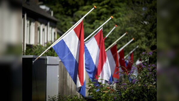 Netherlands mourns as MH17 crash victims' bodies leave Ukraine