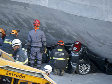 At least two killed as unfinished overpass in World Cup project collapses At least two killed as unfinished overpass in World Cup project collapses