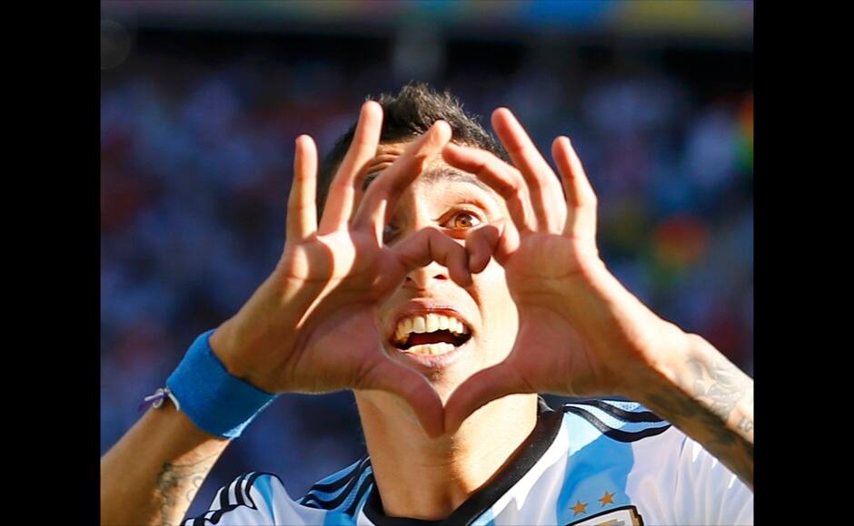 Argentina's Angel Di Maria celebrates scoring against Switzerland during extra time in their 2014 World Cup round of 16 game at the Corinthians arena in Sao Paulo July 1, 2014. REUTERS