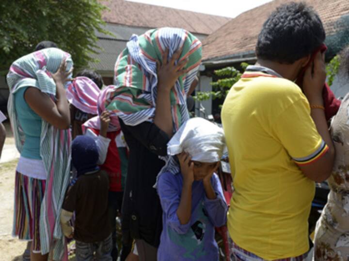 Aus immigration minister defends detention of child asylum-seekers