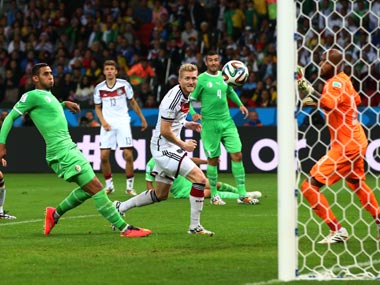 Germany score twice in extra time to edge past battling Algeria Germany score twice in extra time to edge past battling Algeria