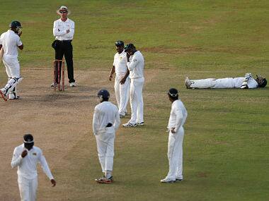 South Africa's Imran Tahir (R) reacts during the fifth and final day of their second test cricket match against Sri Lanka in Colombo. Reuters