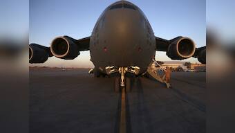 Body of young stowaway found in US military plane 