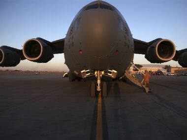Body of young stowaway found in US military plane 