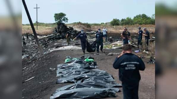 MH17: Rebels bow to world fury, declare truce so bodies can leave crash site