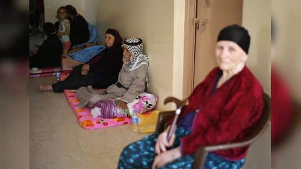 Ancient Christian population of Mosul flees Islamic State