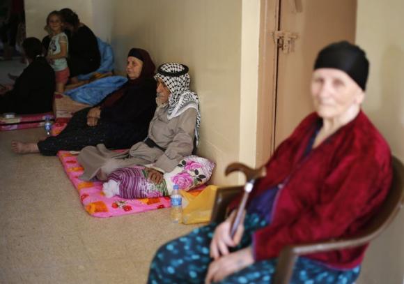 Ancient Christian population of Mosul flees Islamic State Ancient Christian population of Mosul flees Islamic State