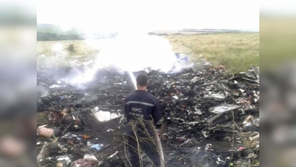 Malaysian plane MH17: 22 bodies counted at Ukraine wreckage site