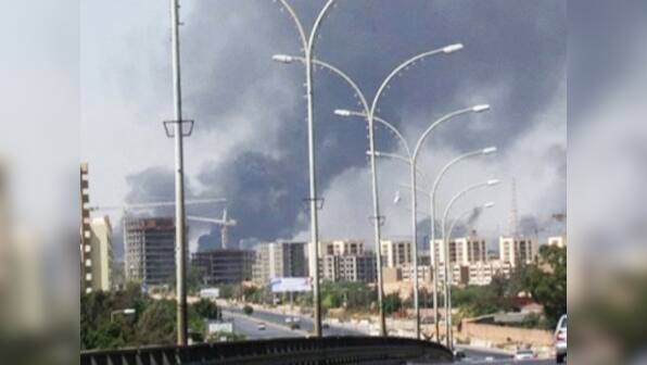 Libya asks for intl help after oil depot catches fire amid clashes