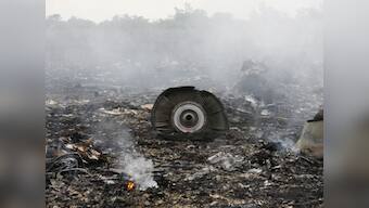 MH17 crash: Plane carrying remains of victims on way to Netherlands