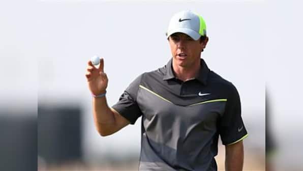 British Open: McIlroy in control, Tiger survives by his fingernails