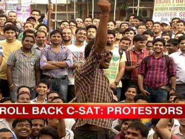 Delhi: UPSC protestors turn violent, torch buses and police booth 