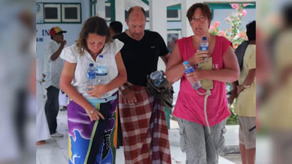 Indonesia tourist boat survivors swam to volcano island, survived on urine
