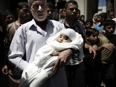 Gaza: Thousand mourn death of Hamas chief's wife, baby son Gaza: Thousand mourn death of Hamas chief's wife, baby son