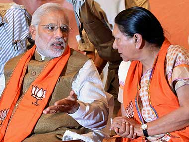 Gujarat CM, governor chant Modi mantra of development on I-Day eve Gujarat CM, governor chant Modi mantra of development on I-Day eve