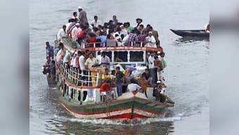 Myanmar ferry capsizes, killing 21 with dozens missing 