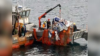 NZL fishing boat hauls in strange catch: A small plane with a body inside