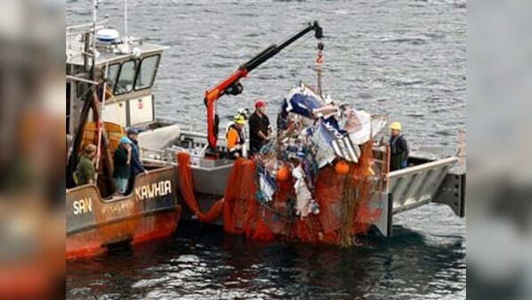 NZL fishing boat hauls in strange catch: A small plane with a body inside