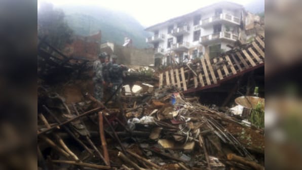 China: Rescuers race to find survivors after 381 die in earthquake