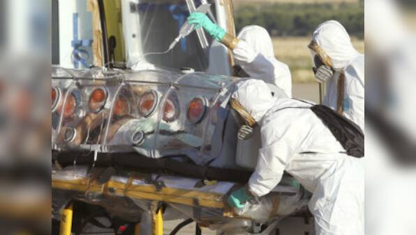 Japan develops trial Ebola drug, says ready to provide it to the world