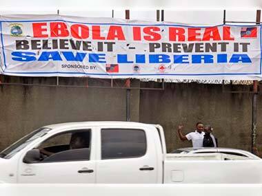 Liberia reopend a slum barricaded to fight Ebola. AP