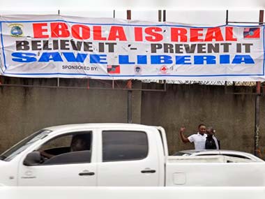 Liberia reopens slum barricaded to contain Ebola spread Liberia reopens slum barricaded to contain Ebola spread