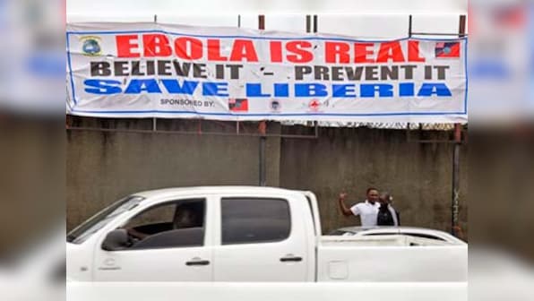 Liberia reopens slum barricaded to contain Ebola spread