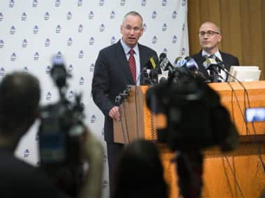 David Reich, President of Mount Sinai Hospital, center, speaks during a news conference alongside Jeremy Boal, Chief Medical Officer for the Mount Sinai Health System, right, at Mount Sinai Medical Center where a male patient with a high fever and gastrointestinal symptoms is undergoing testing for the Ebola virus. AP