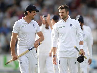 England's captain Alastair Cook (L) and James Anderson leave the field after England won the fourth cricket test match against India at Old Trafford. Reuters 