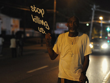 Police officer guns down black teen in St Louis, Missouri Police officer guns down black teen in St Louis, Missouri