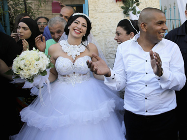 Israel: Jewish woman, Muslim man marry amid protests sparked by Gaza Israel: Jewish woman, Muslim man marry amid protests sparked by Gaza