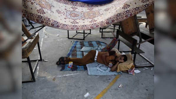 Gaza citizens warily begin returning to normal life
