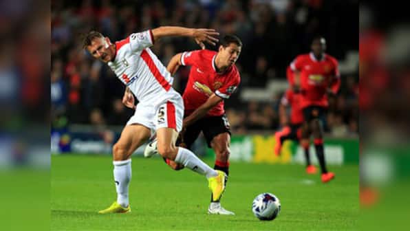 Third division side MK Dons embarrass Manchester United 4-0 in League Cup