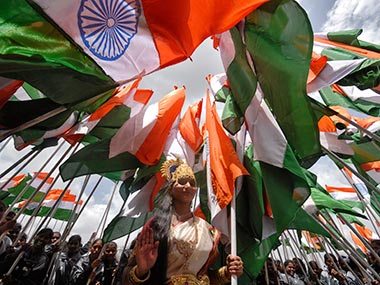 Ugly Indian patriot: foreigner refuses to stand for national anthem; mob thrashes Indian friend Ugly Indian patriot: foreigner refuses to stand for national anthem; mob thrashes Indian friend