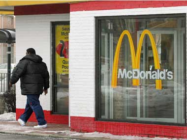 China tries five cult members for murdering woman at McDonald's China tries five cult members for murdering woman at McDonald's