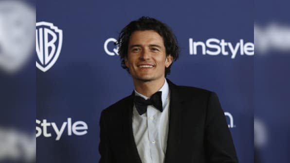 Miranda Kerr who? Orlando Bloom busy cosying up with ex-wife of billionaire