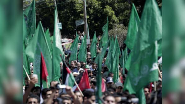 Violence escalates as Palestinians torch Jewish holy site at West Bank