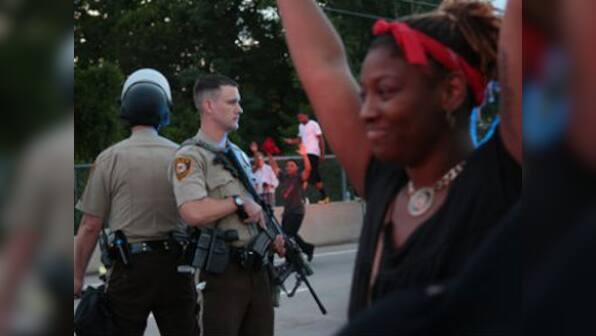 Ferguson unrest: Police shoot suspect dead near protest scene