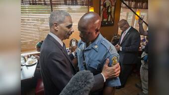Ferguson: US Attorney General says he understands lack of trust in police 