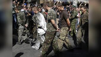 Ukraine, rebels exchange prisoners as part of cease-fire agreement