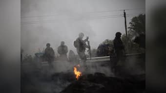 Ukraine death toll edges up amid sporadic violations of ceasefire