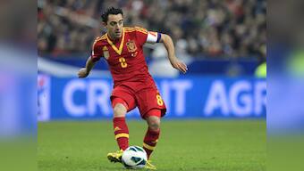 Spain's Xavi retires from international football, says his time has ended