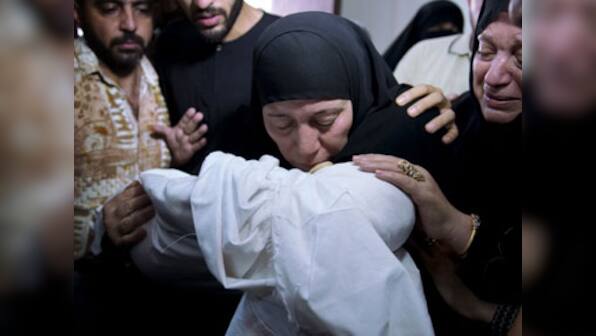 Israeli warplanes pound Gaza as mourners bury Hamas leader's wife, baby